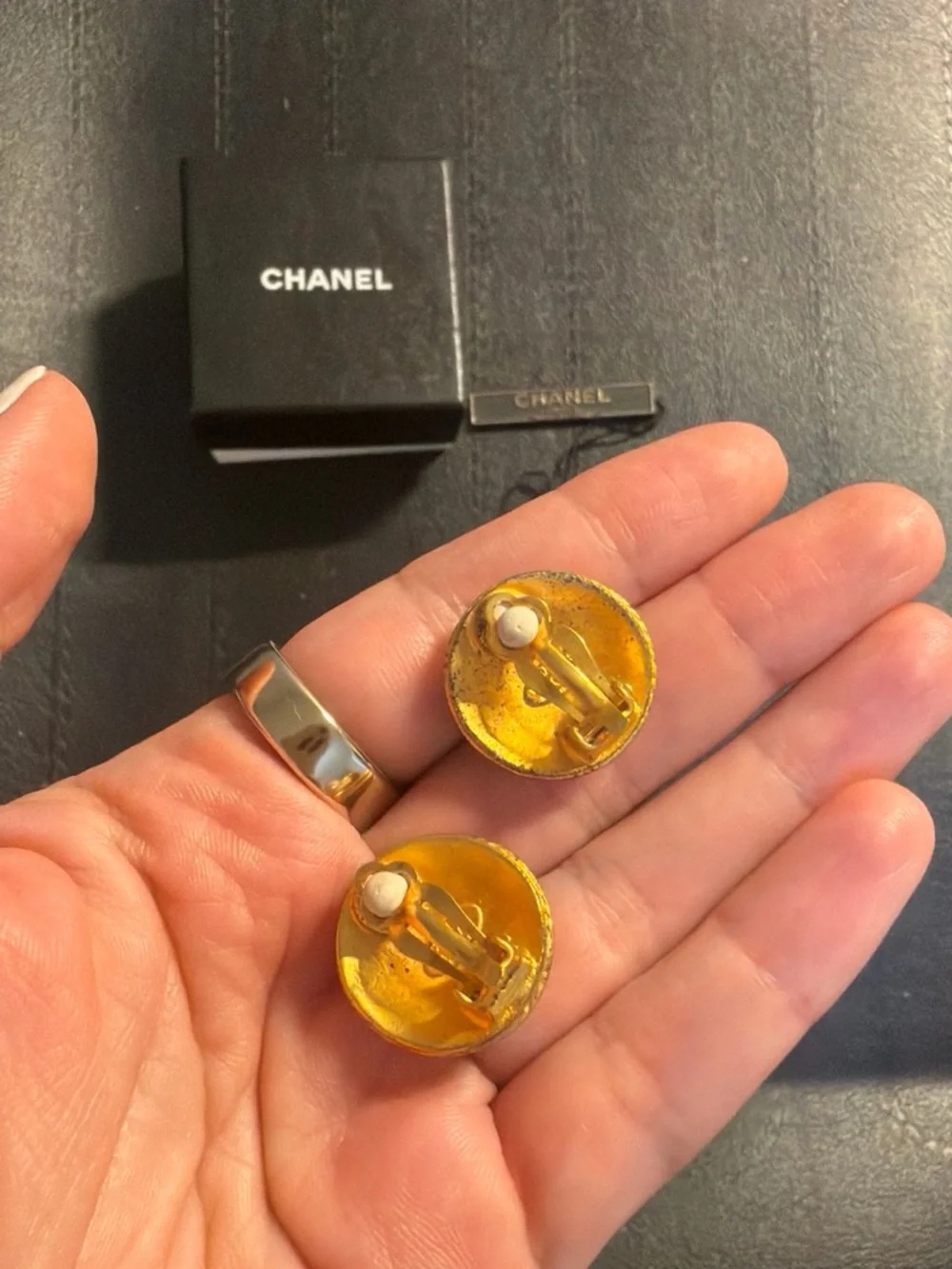 CHANEL Gold Tone Embossed Logo Cuff Links